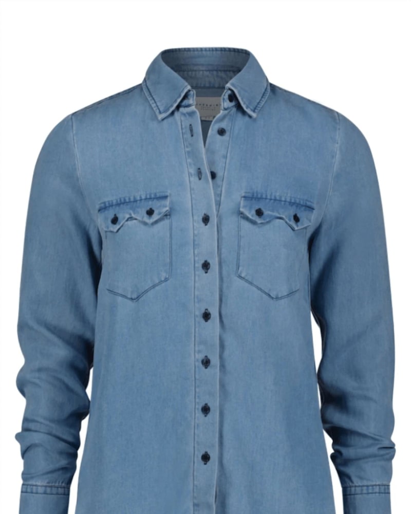 Front of a model wearing a size L The Cowgirl Shirt in Denim in Denim by THE SHIRT. | dia_product_style_image_id:363163